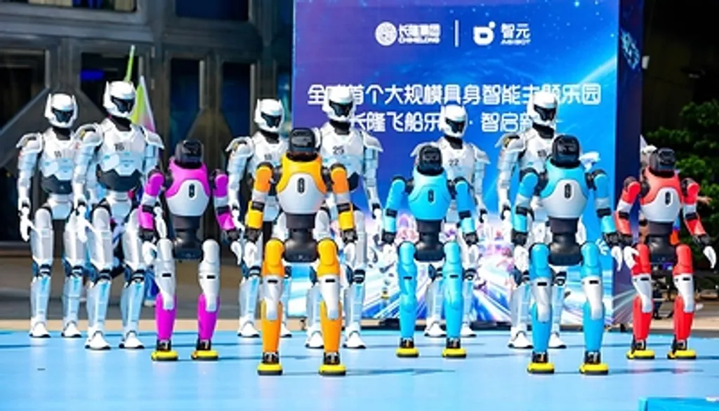A lineup of about eight humanoid robots with different colored torsos and limbs (white, pink, blue, orange, red) standing on an event stage in front of a Chinese-language launch banner.